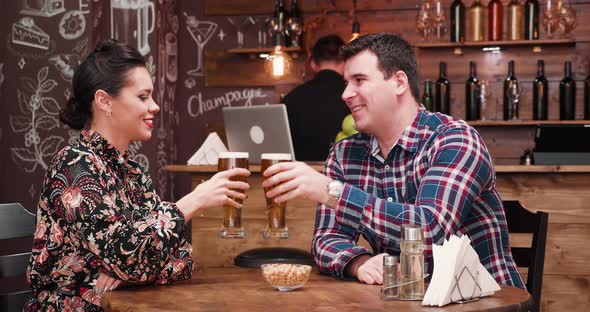 Beautiful Couple Drinking Beer