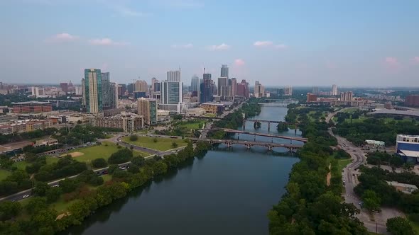 AERIAL: Drone flying towards Austin, Texas on a beautiful sunny day.