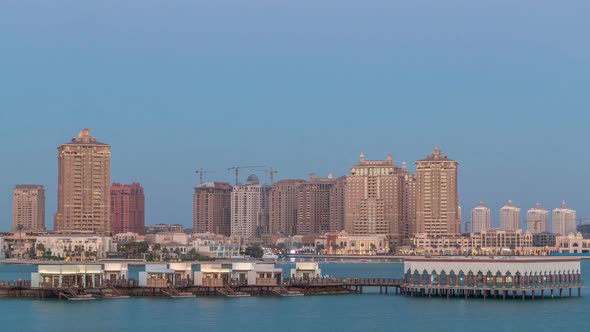 View From Katara Beach Day to Night Timelapse in Doha Qatar Towards the Pearl