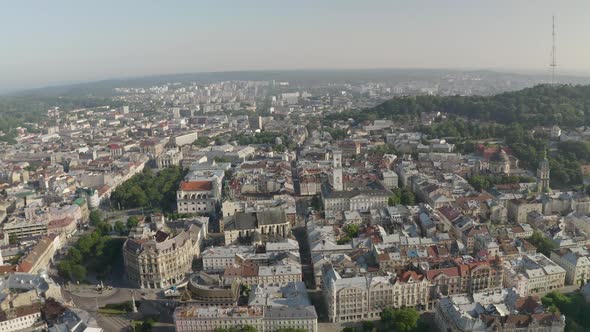 Aerial Drone Video of European City Lviv Ukraine Rynok Square Central Town Hall Dominican Church