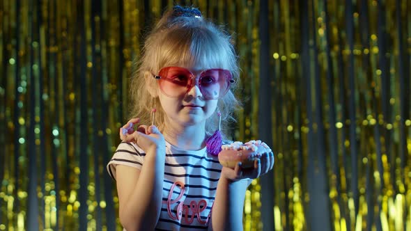 Stylish Trendy Young Child Girl at Disco Party Cyberpunk Club Eating Big Chocolate Bar Sweet Candy