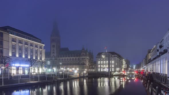 Night to Day Time Lapse of town hall with fog, Hamburg, Germany