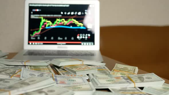 Lots of Money and Computer alt