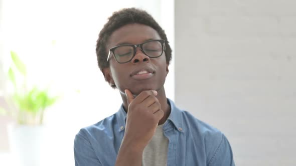Portrait of Pensive Young African Man Thinking New Plan