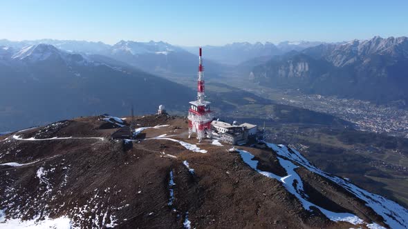 Aerial circling Patscherkofel ski resort on sunny day, Innsbruck