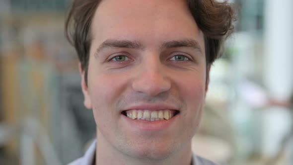 Face Close Up of Man Smiling at the Camera