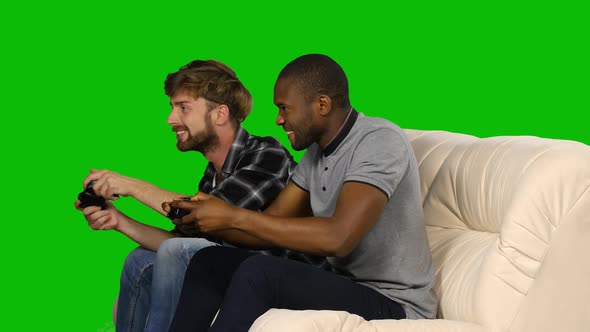 Man Who Won the Game on the Console Is Dancing. Green Screen