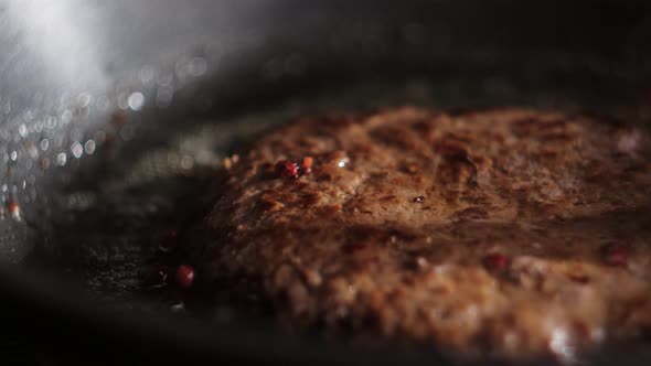 Frying Burger Bread in Pan Closeup