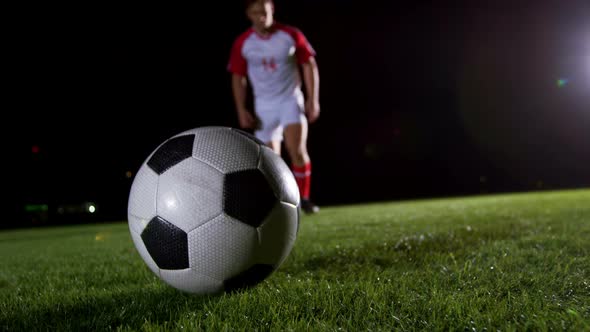 Soccer player kicking the ball 4k