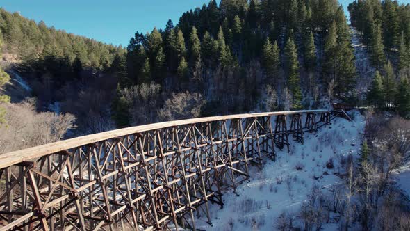 Aerial drone view of a large bridge that was built in the 1800s