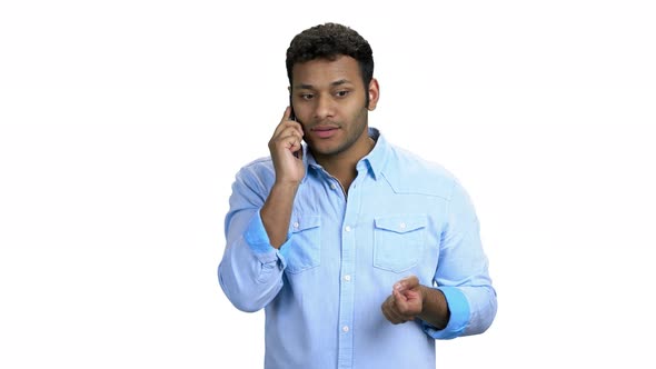 Excited Indian Man Talking on Phone