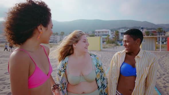 young women having fun on the beach