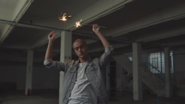 Fashionable young man in an abandoned warehouse