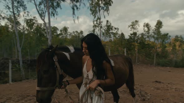 Young Woman Rides a Horse