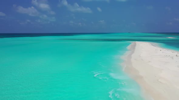 Aerial drone tourism of exotic coastline beach lifestyle by turquoise water and white sandy backgrou