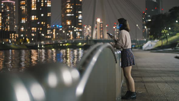 Girl Listening To Music At Night 