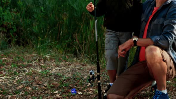 Father and son interacting with each other in the park