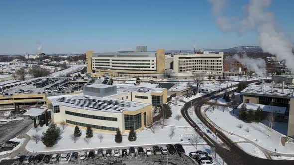 Aerial view of large business complex in winter on bright sunny day in Wisconsin.