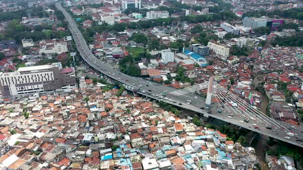 Pasupati Cable-stayed bridge in Bandung, West Java Indonesia with Grandia Hotel, Aerial tilt up reve