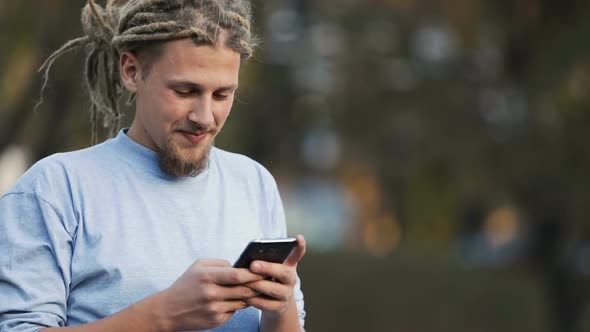 Boy Texts in Street