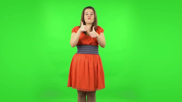 Cute Girl Showing Thumbs Up, Gesture Like. Green Screen