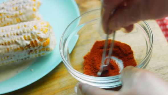 Mix Paprika and Chili Powder in a Bowl
