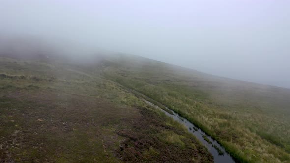 Flying Through Dense Fog at Glengad Mountain at Malin in County Donegal - Ireland