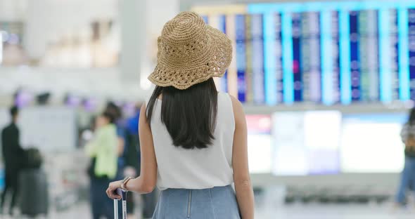 Woman go travel, waiting at airport