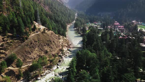 Aerial view of Himachal Pradesh Parvati Valley river, drone reveal Himalayan mountains landscape wit