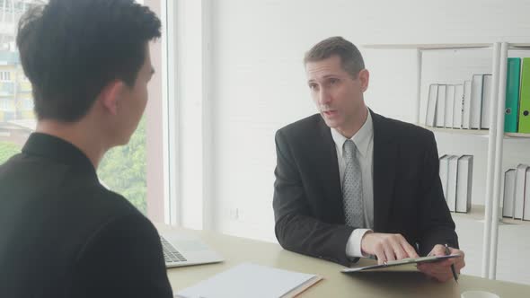 Young asian business man with applicant job interview having stress and sad at the office.