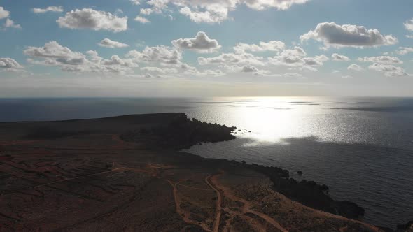 Aerial drone video from northern Malta near the Ghajn Znuber Tower.