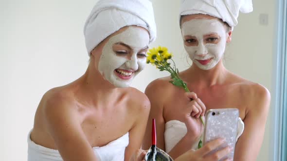 Beautiful Woman Having a Facial Treatment at Spa