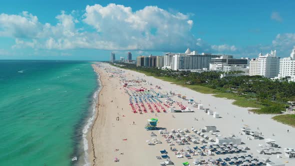 Miami South Beach Sunrise with Lifeguard Tower and Coastline with Colorful Cloud and Blue Sky South