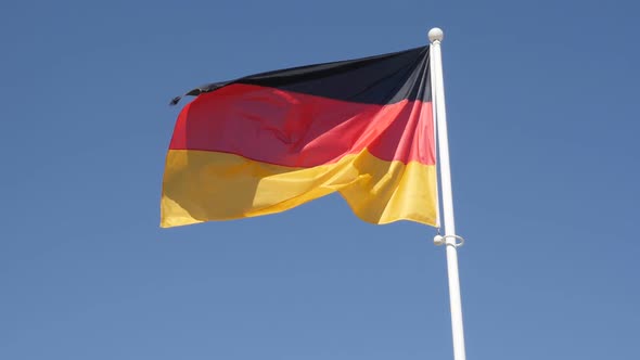 Famous  German flag on flag-pole floating in slow motion on wind 1080p HD footage - Recognizable  Ge