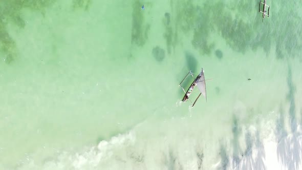 Vertical Video Boats in the Ocean Near the Coast of Zanzibar Tanzania Aerial View