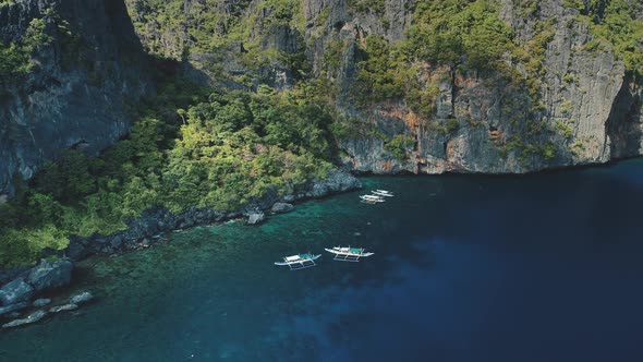 Passenger Boat Closeup Aerial View at Cliff Ocean Shore