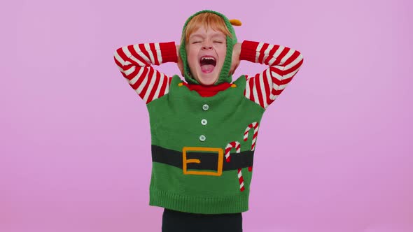 Girl Toddler Christmas Elf Covering Ears and Gesturing No Avoiding Advice Ignoring Unpleasant Noise