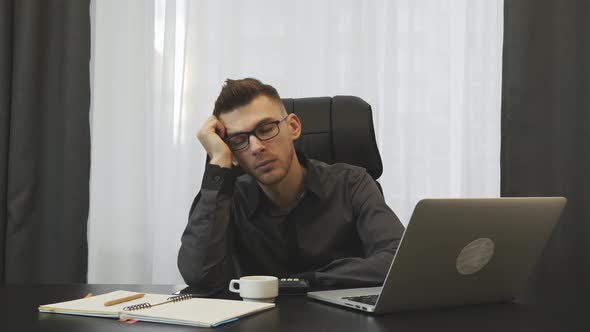 Boss Broker sleeping during working day in office