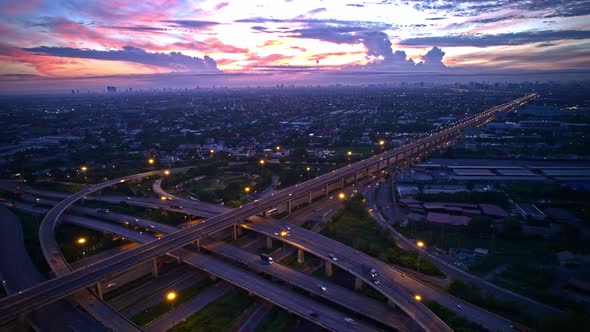 4K : Aerial view shot of fast moving above interchange