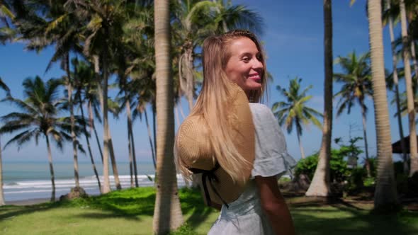 Happy Pretty Girl in Tropics