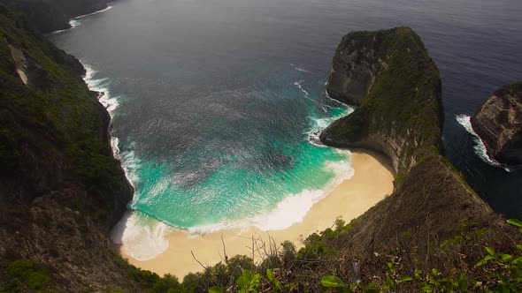 Rocky Cliff with Beach in the Sea