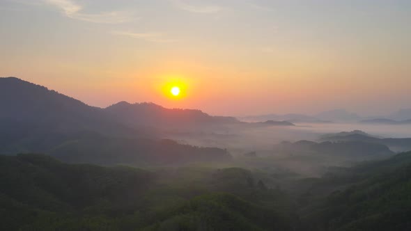 Aerial view video nature morning time and sea of fog mountain