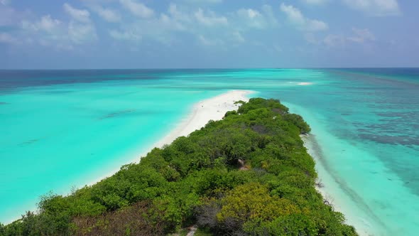 Aerial above nature of idyllic bay beach lifestyle by shallow lagoon and white sandy background of a