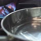 Heating Oil in Frying Pans Above Modern Stove in Kitchen - VideoHive Item for Sale