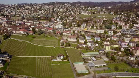 View of Pully, small city next to Lausanne. aerial drone shot, vineyards. Switzerland