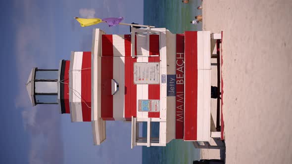 Vertical Video Miami Beach Jetty Lifeguard Tower Red And White 4k