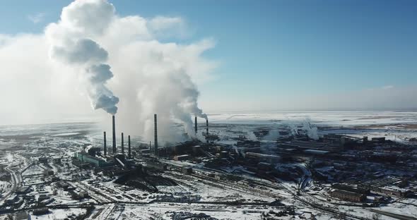 Smoke From the Pipes of a Factory Near the City