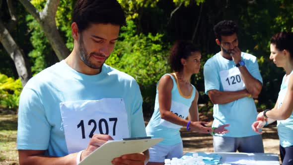 Athletes registering themselves for marathon 4k