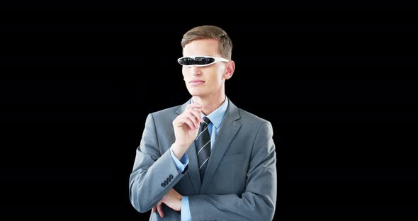 Businessman in virtual video glasses using digital screen