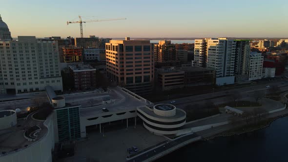 downtown madison transportation and traffic next to a lake aerial footage